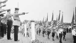 German American Bund Members march by Bundsfuhrer Fritz Kuhn during a March in New Jersey circa 1938.